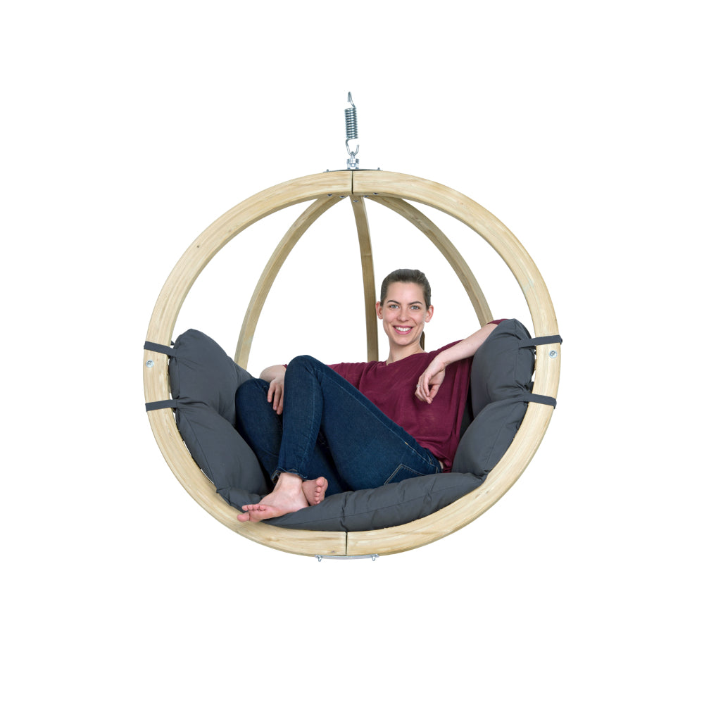 Single size hanging basket with woman relaxing in